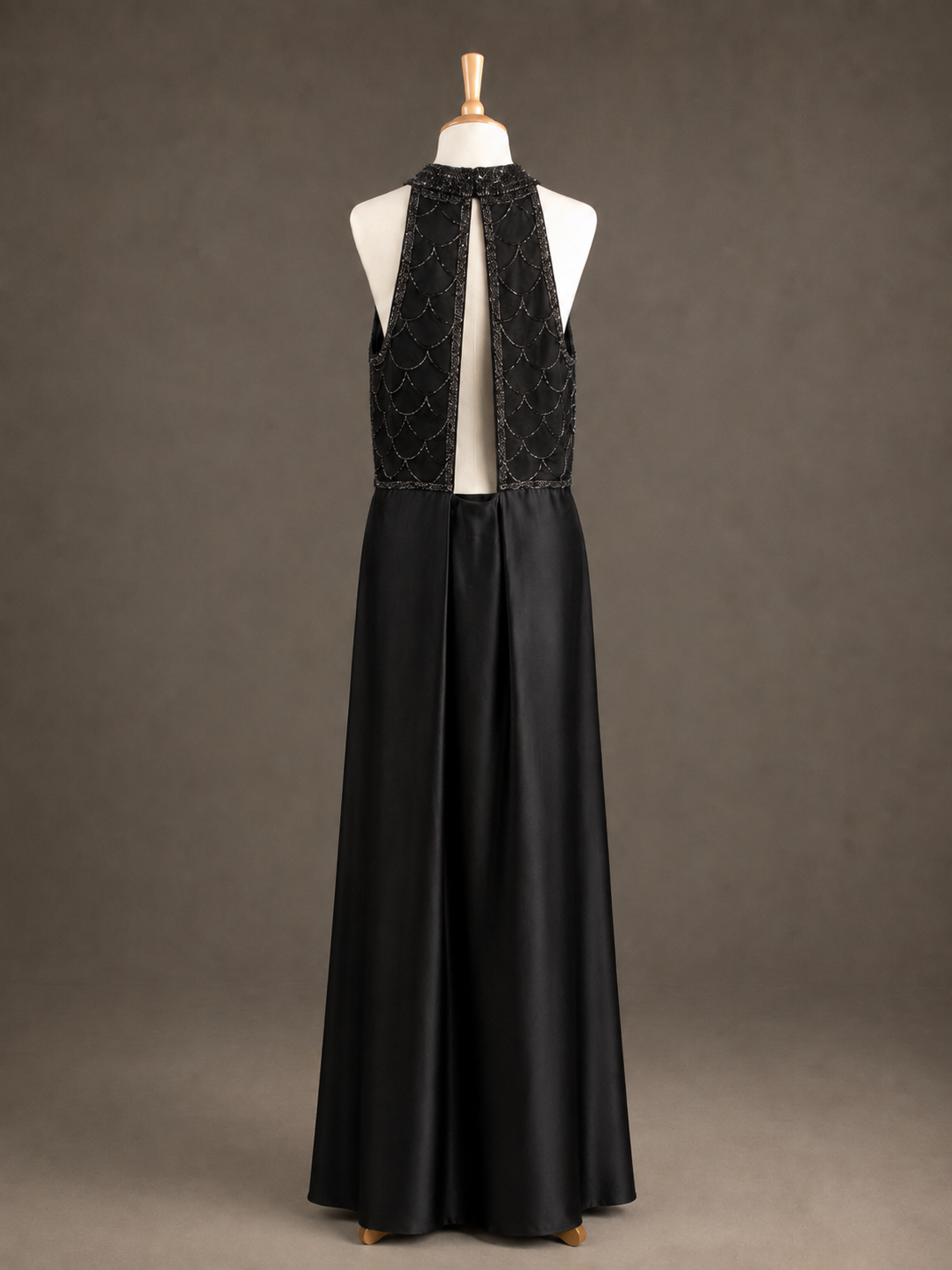 Obsidian Black Cut-Out Back Halter Evening Gown view 1